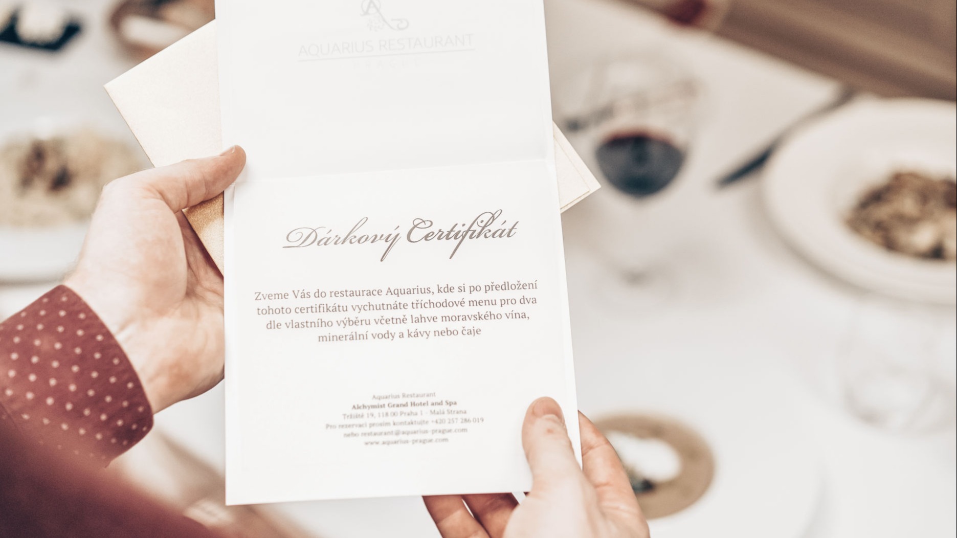 Restaurant gift certificate in hands